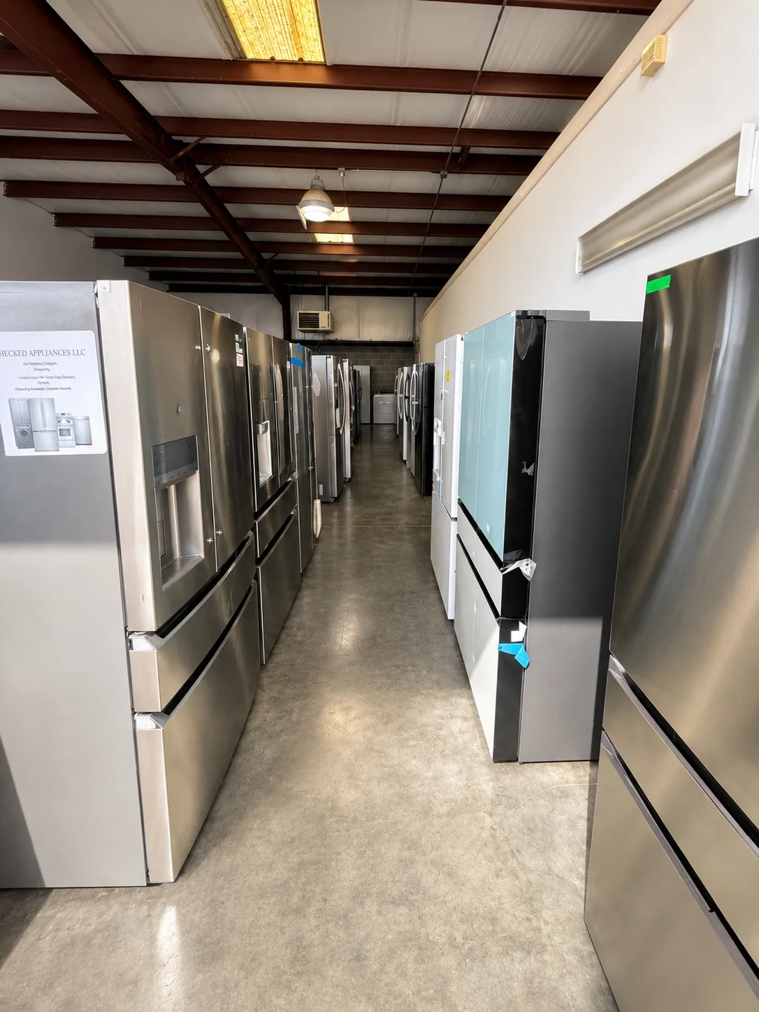 Refrigerators on the showroom floor at Checked Appliances in Knoxville